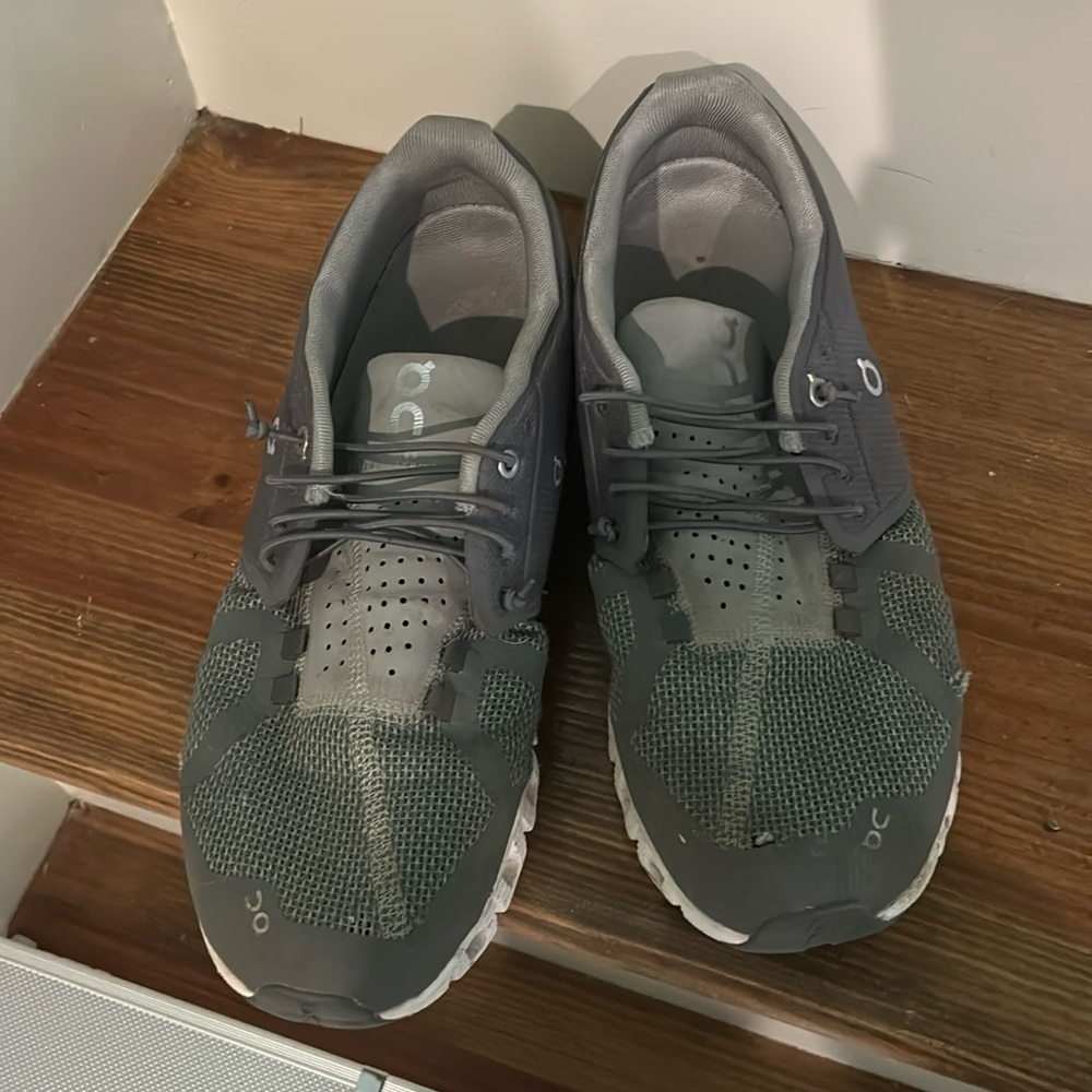 On Clouds. Mens. 10.5. Used condition. Small hole on left toe.